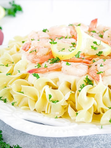 Shrimp alfredo pasta is a delectable Italian-inspired dish made out of juicy shrimp, al dente pasta, and a creamy homemade Alfredo sauce.