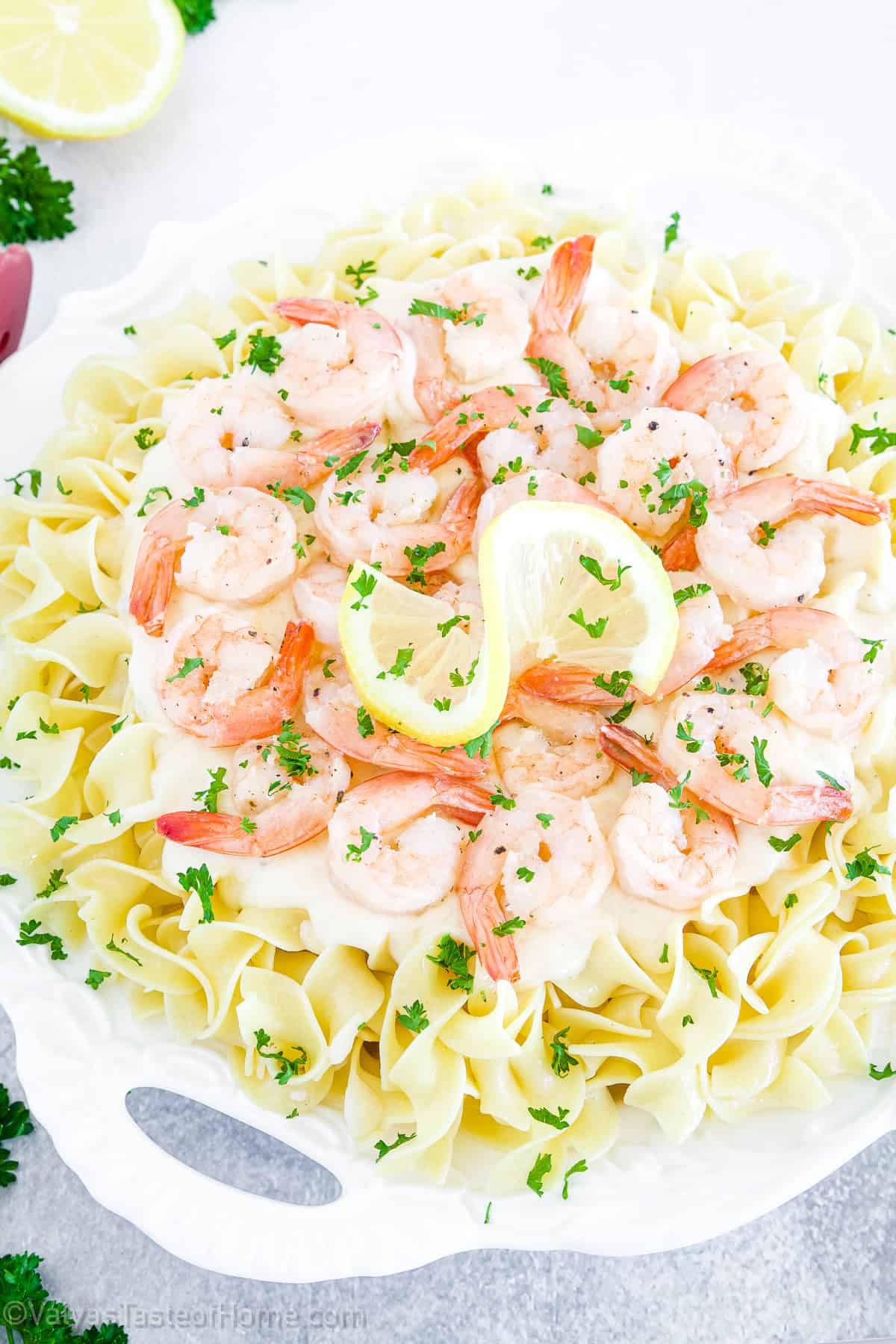 This shrimp alfredo pasta recipe is sure to impress everyone, whether you're making it for a special meal for two or a dinner party with friends. 