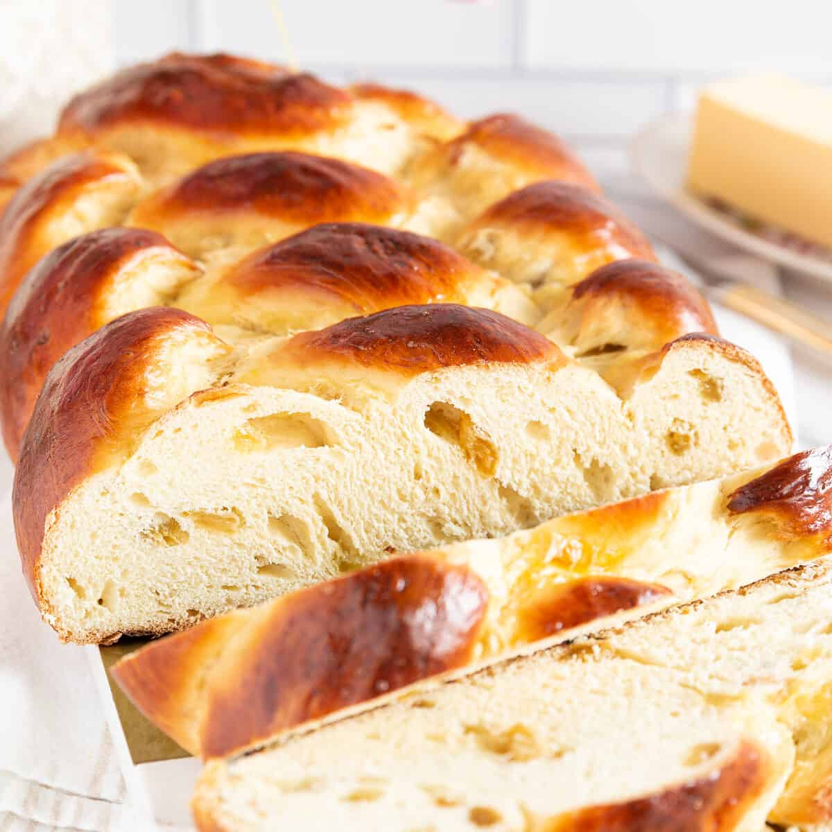 Have this sweet braided bread with a little butter spread and a hot cup of tea or coffee, as we do in our household. The bread itself is soft, moist, and sweet.