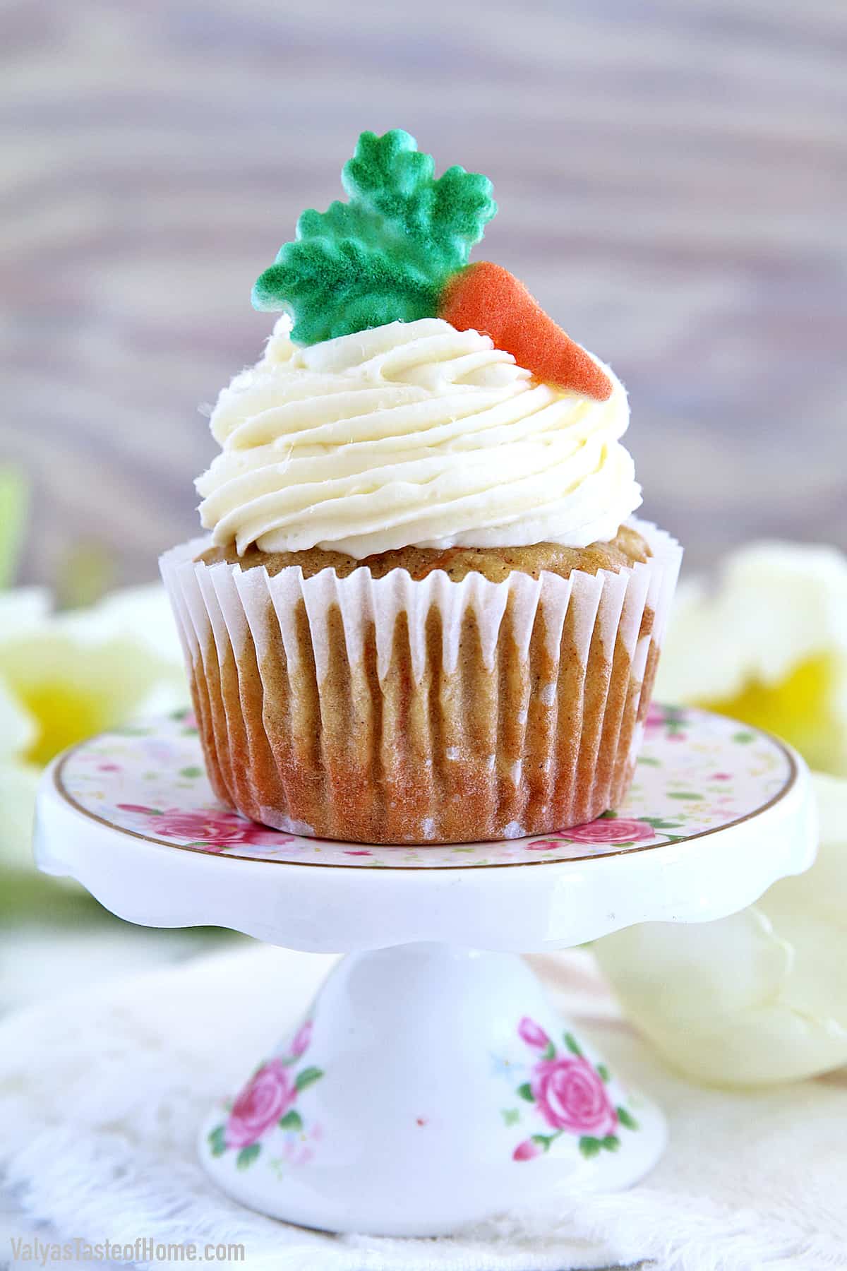 These The Best Carrot Cake Cupcakes are moist, fluffy, and spongy soft, delicious cupcakes you'll ever try. They are made completely from scratch, down to the freshly grated carrots, and topped with a generous swirl of the absolute best cream cheese frosting!