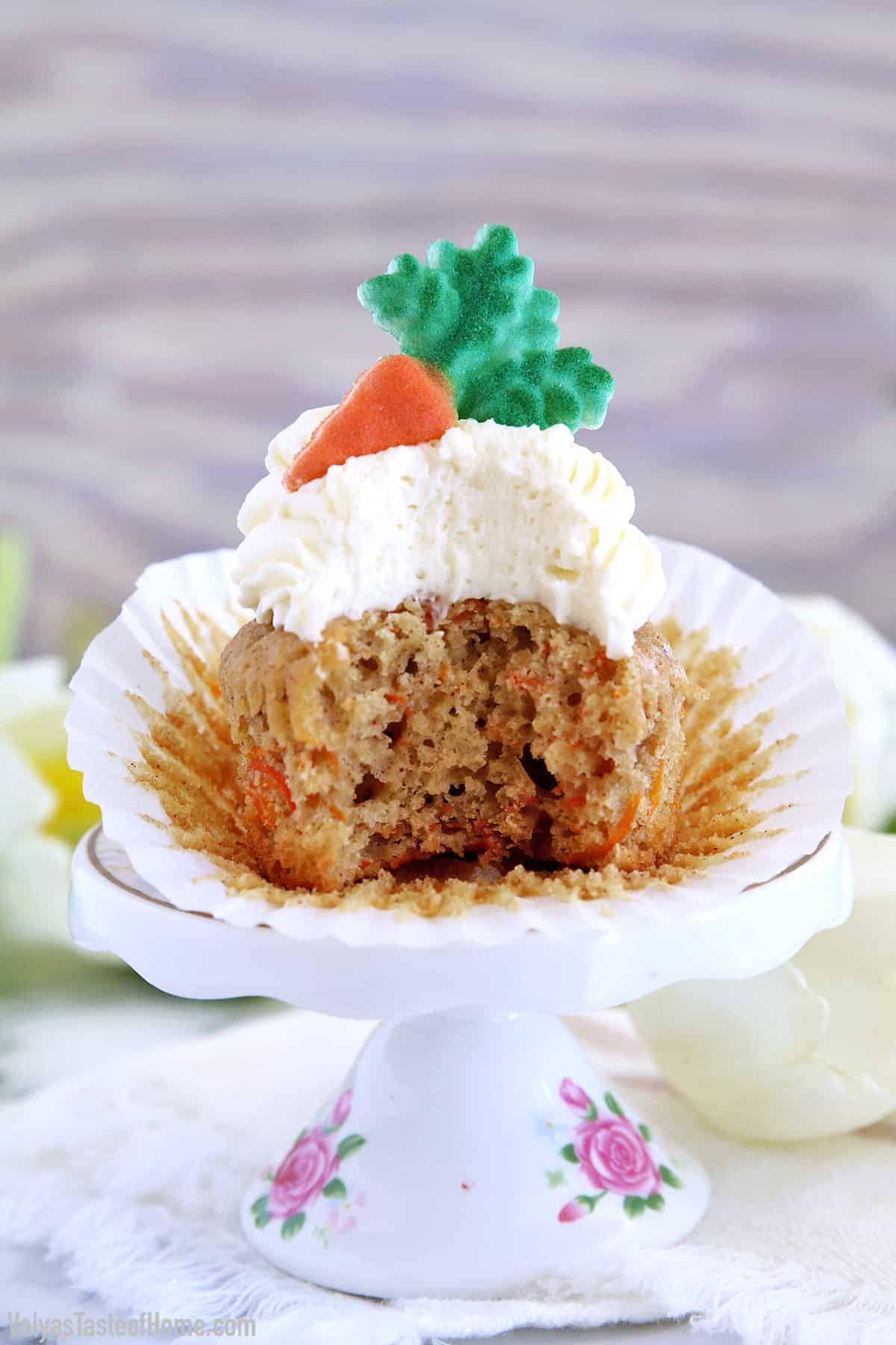 These The Best Carrot Cake Cupcakes are moist, fluffy, and spongy soft, delicious cupcakes you'll ever try. They are made completely from scratch, down to the freshly grated carrots, and topped with a generous swirl of the absolute best cream cheese frosting!