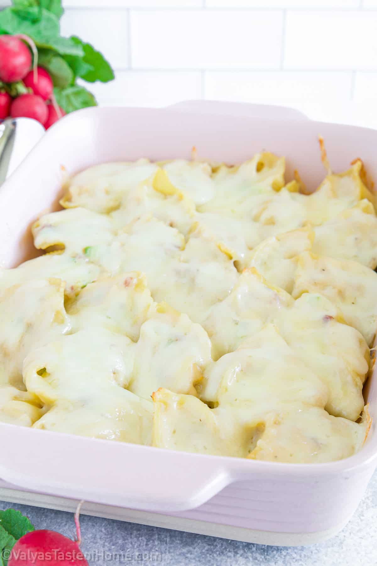This chicken alfredo stuffed shells recipe features jumbo pasta shells and creamy, homemade alfredo sauce. It's an easy weeknight meal that can be prepped a day ahead! 