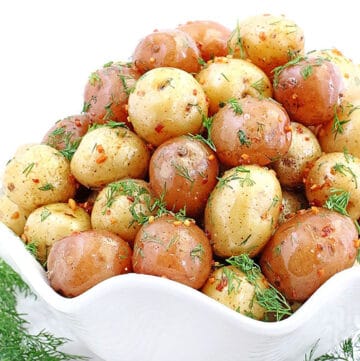 This delicious Roasted Baby Potatoes recipe takes only 30 minutes to make for the most delicious oven-roasted potatoes that are crispy on the outside, and buttery soft on the inside.