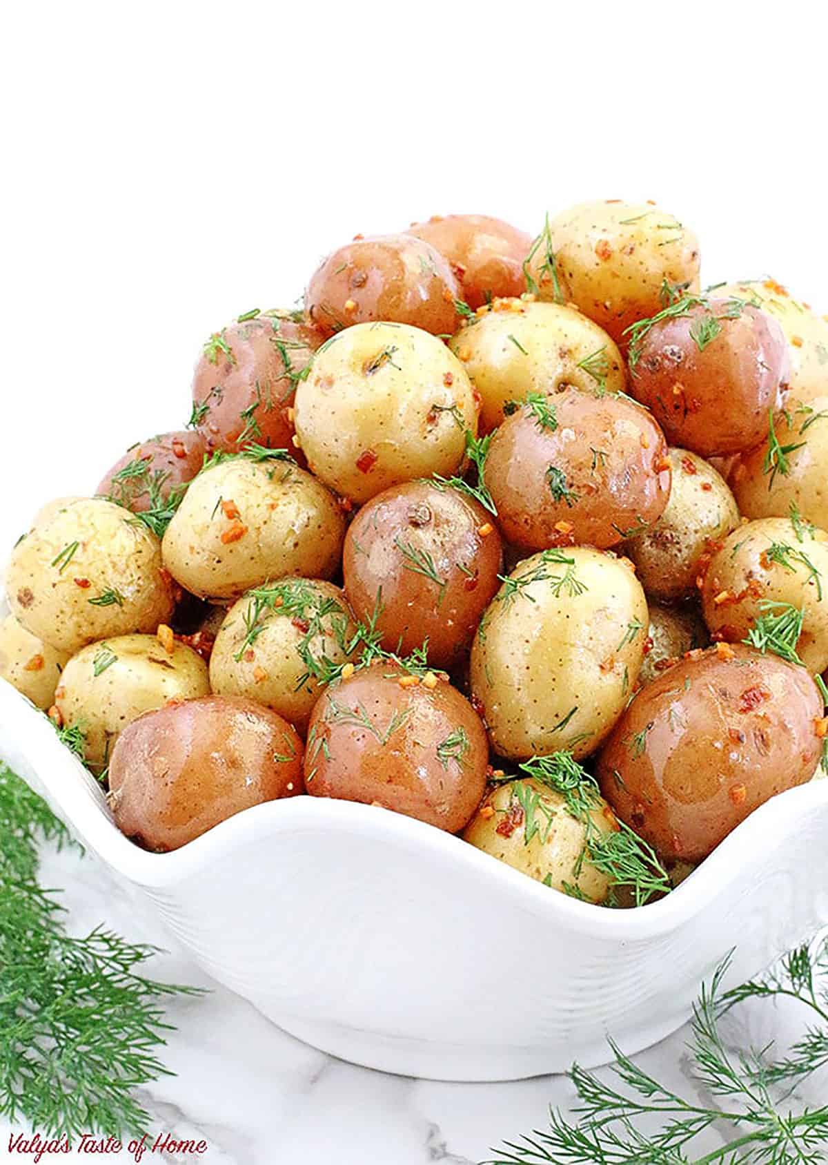 This recipe takes only 30 minutes to make for the most delicious oven-roasted potatoes that are crispy on the outside, and buttery soft on the inside.