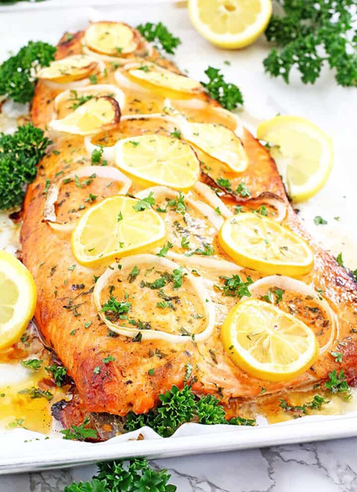 This delicious Lemon Pepper Salmon is soft, juicy, and bursting with the perfect balance of lemon and pepper for the best flavor ever with only 10 mins of prep!