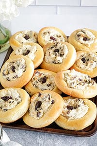 This is seriously the tastiest sweet buns recipe ever and it'll give you soft, fluffy sweet buns filled with a creamy farmer's cheese-based filling and raisins.