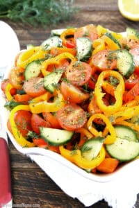 This Sweet Pepper Tomato Cucumber Salad is crunchy, soft, sharp, smooth, aromatic, and savory!