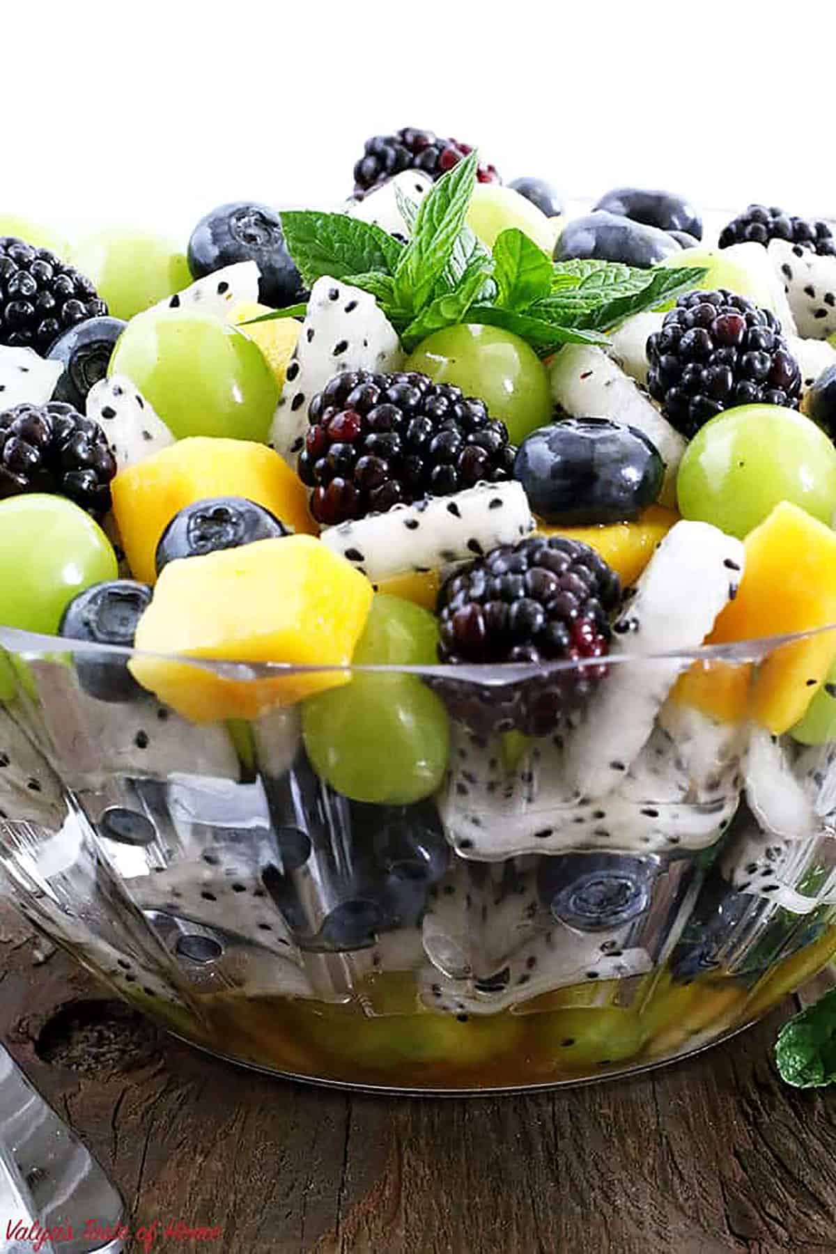 This Summer Fruit Salad is the ideal combination of chopped seasonal, summer fruits with perfect fruit salad dressing!