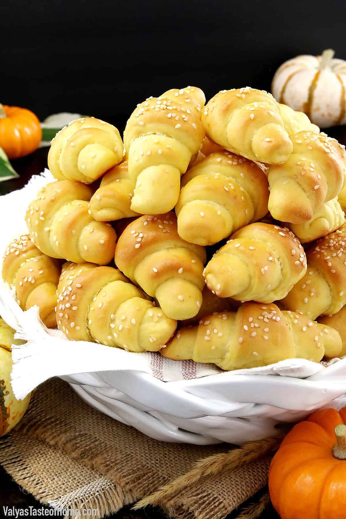 These super easy Pumpkin Dinner Rolls are made with pumpkin puree for the perfect pumpkin flavor and the tastiest side dish on your Thanksgiving dinner table!