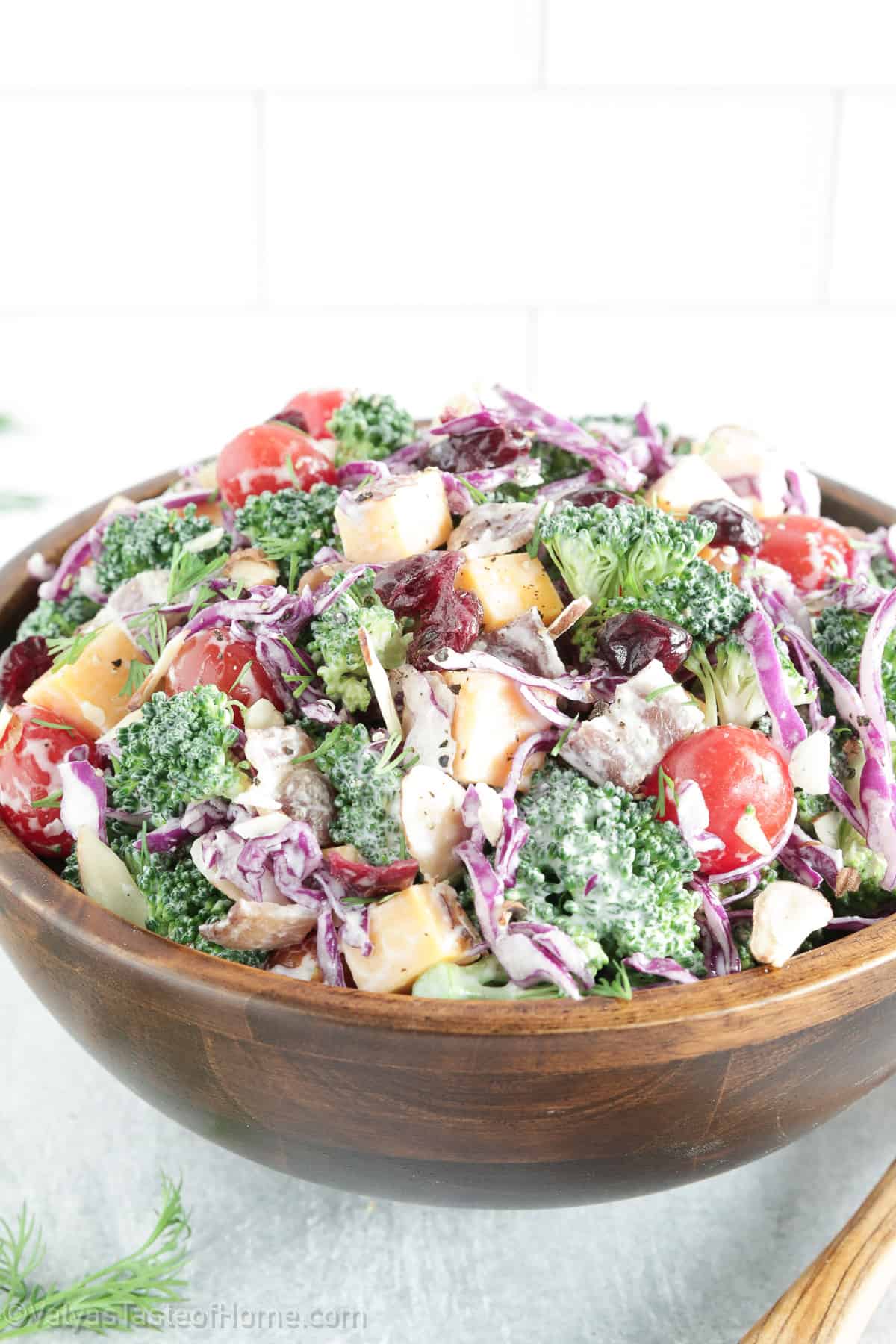 This Broccoli Tomato Salad is the perfect mix of veggies with a creamy mix of homemade dressing for the tastiest side dish salad you've ever had!