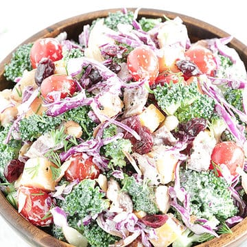 Broccoli tomato salad is a delicious and nutritious side dish that combines fresh broccoli florets with juicy cherry tomatoes, crunchy red cabbage, and a creamy dressing.