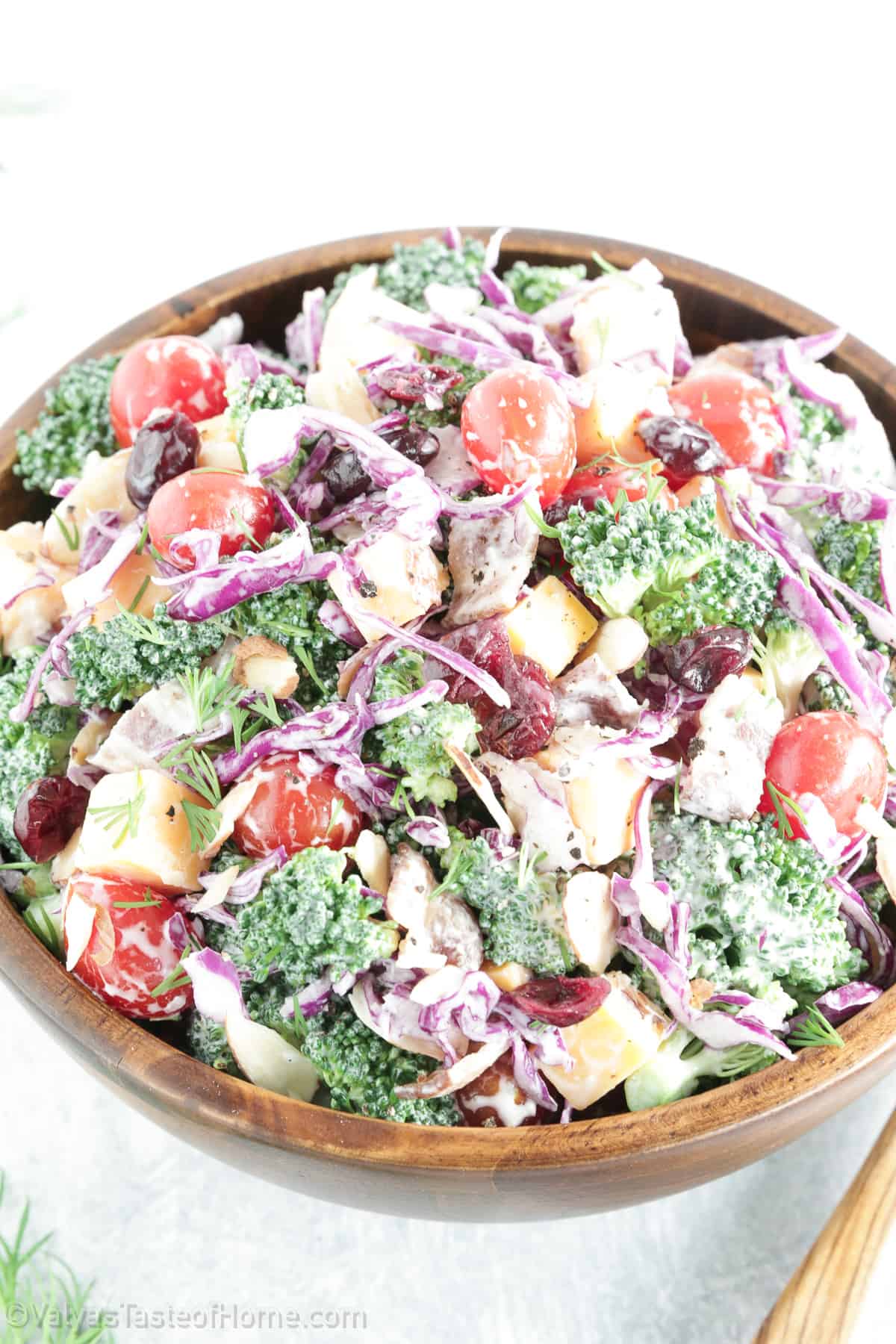 Broccoli tomato salad is a delicious and nutritious side dish that combines fresh broccoli florets with juicy cherry tomatoes, crunchy red cabbage, and a creamy dressing.