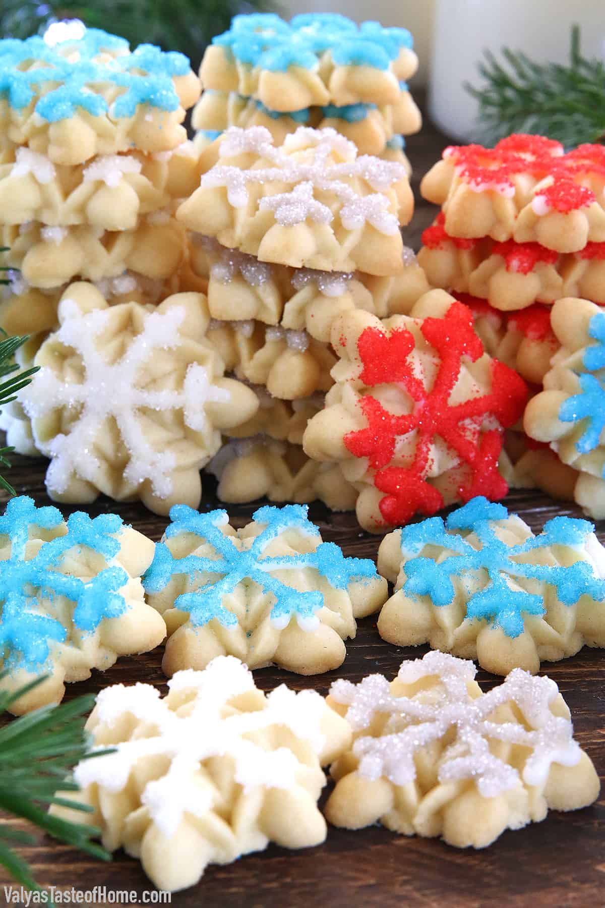 Christmas Snowflake Spritz Cookies are some of the easiest cookies to make and are widely loved by most people. They are crisp, buttery, and delicious cookies that are made using an easy cookie press. And the result is so gorgeous and festive!