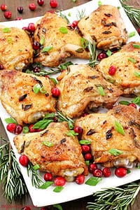 This Christmas Chicken recipe is going to win your hearts this holiday season, thanks to the juicy and tender chicken thighs that are marinated and then baked to perfection!