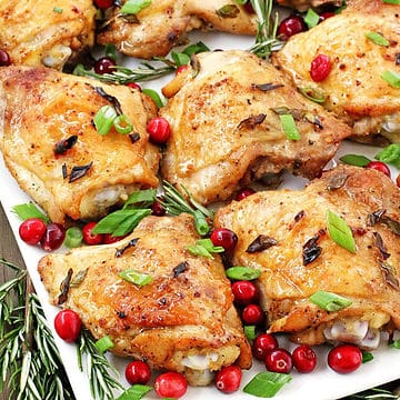 This Christmas Chicken recipe is going to win your hearts this holiday season, thanks to the juicy and tender chicken thighs that are marinated and then baked to perfection!