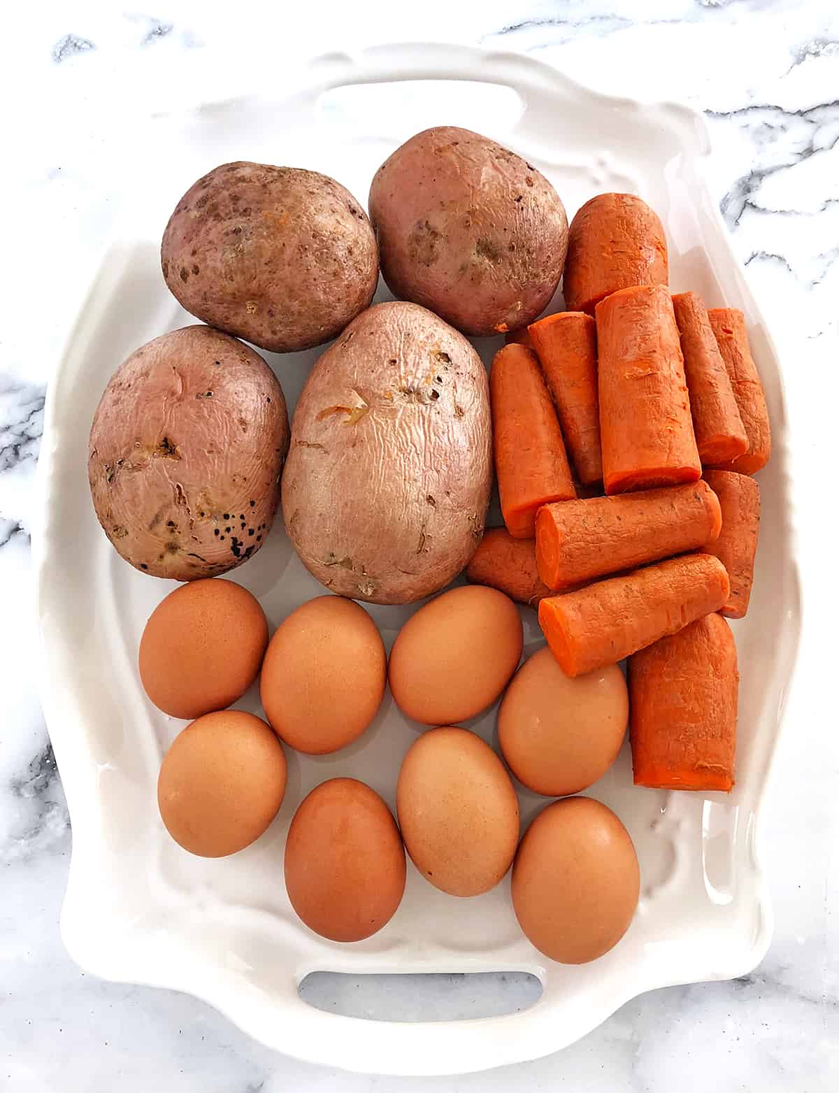 All you need are some pantry staple ingredients to whip up the most delicious, creamy potato salad recipe ever!