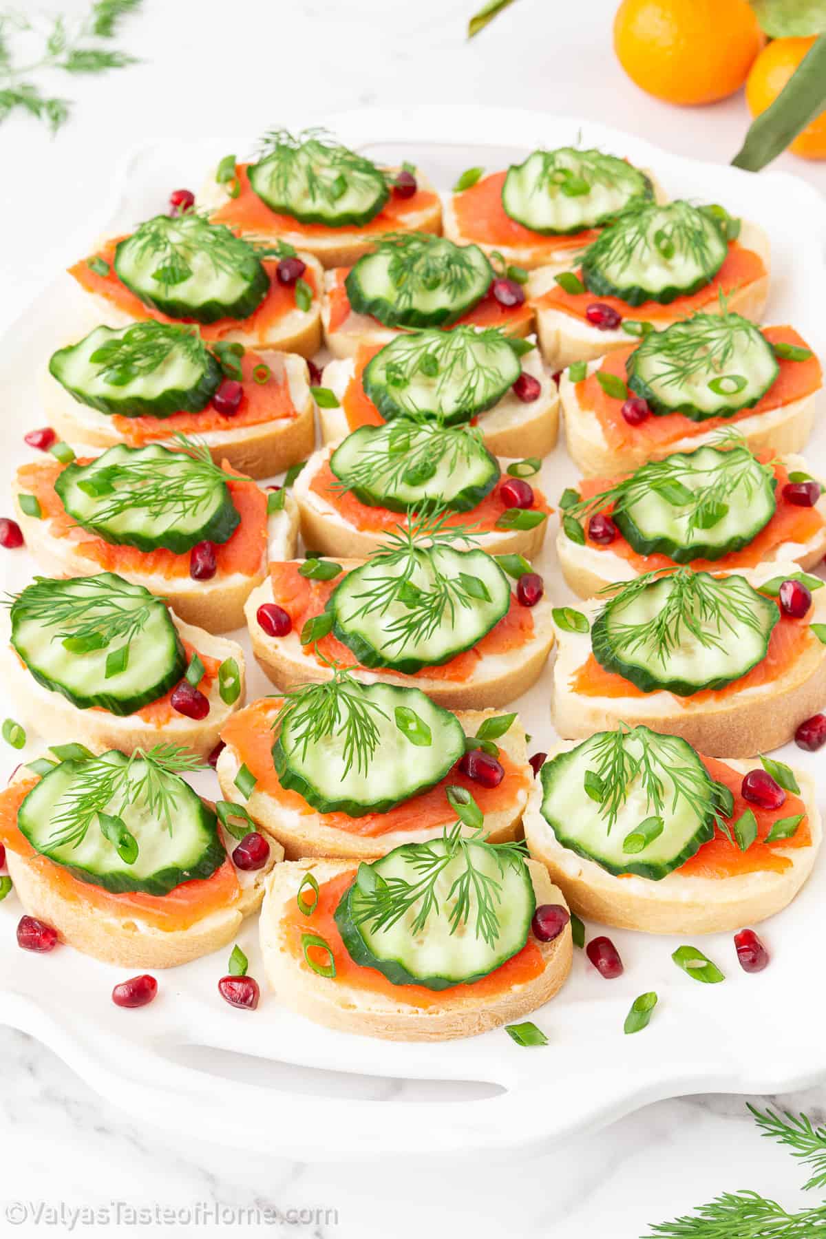 These Smoked Salmon Canapés not only taste incredible but they decorate your party table perfectly! Plus they're easy to make with a classic flavor combination!