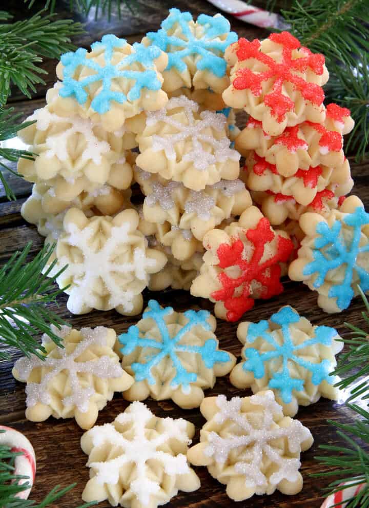 Christmas Snowflake Spritz Cookies are some of the easiest cookies to make and are widely loved by most people. They are crisp, buttery, and delicious cookies that are made using an easy cookie press. And the result is so gorgeous and festive!