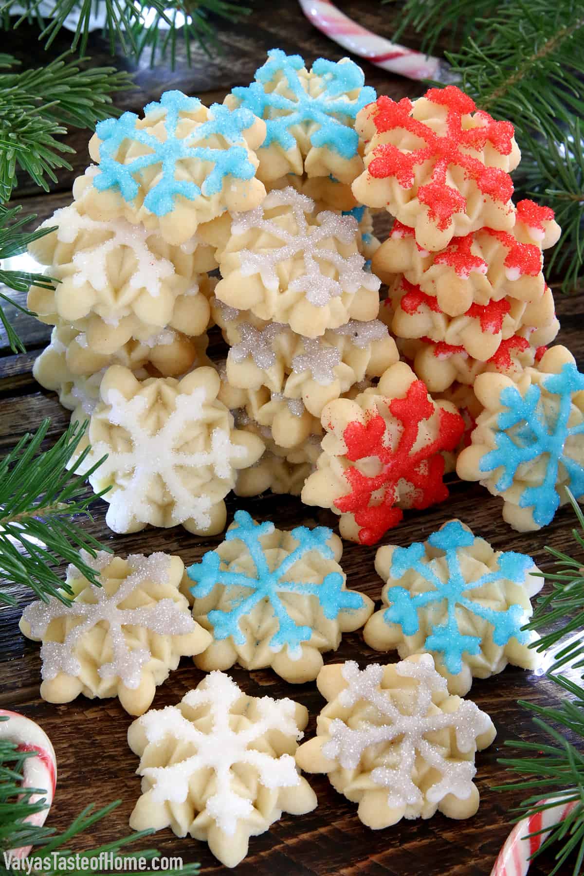 Christmas Snowflake Spritz Cookies are some of the easiest cookies to make and are widely loved by most people. They are crisp, buttery, and delicious cookies that are made using an easy cookie press. And the result is so gorgeous and festive!