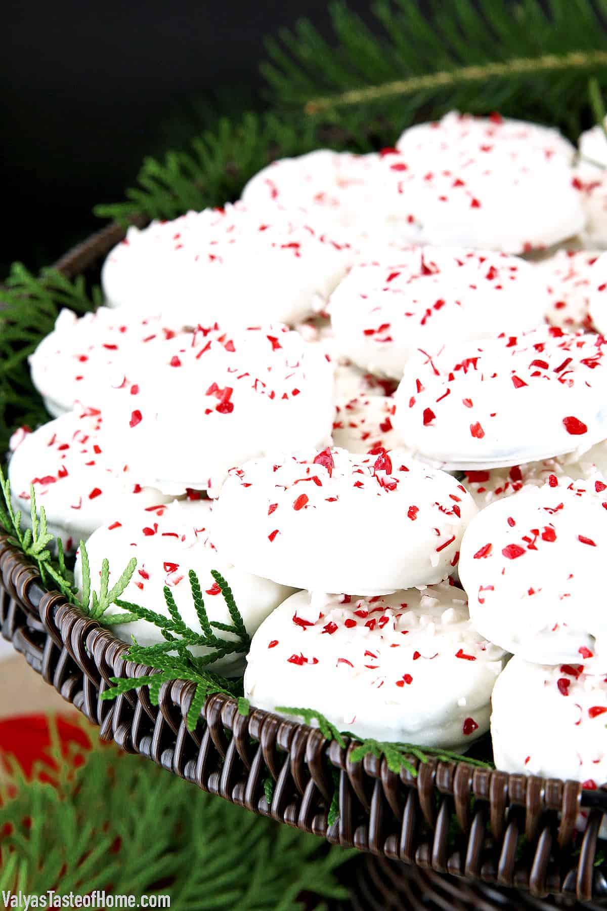 These oreo cookies dipped in white chocolate and sprinkled with crushed peppermint candies are festive, very attractive, and make for a beautiful display on a party tray.