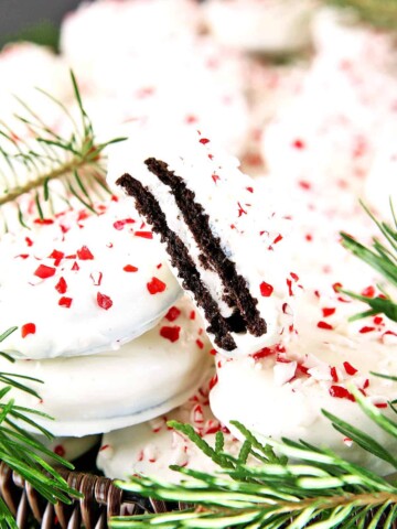 These 3-ingredient Peppermint Oreos are the best ones you'll ever try! They're super easy to make and a great activity for the kids to make for the holidays.