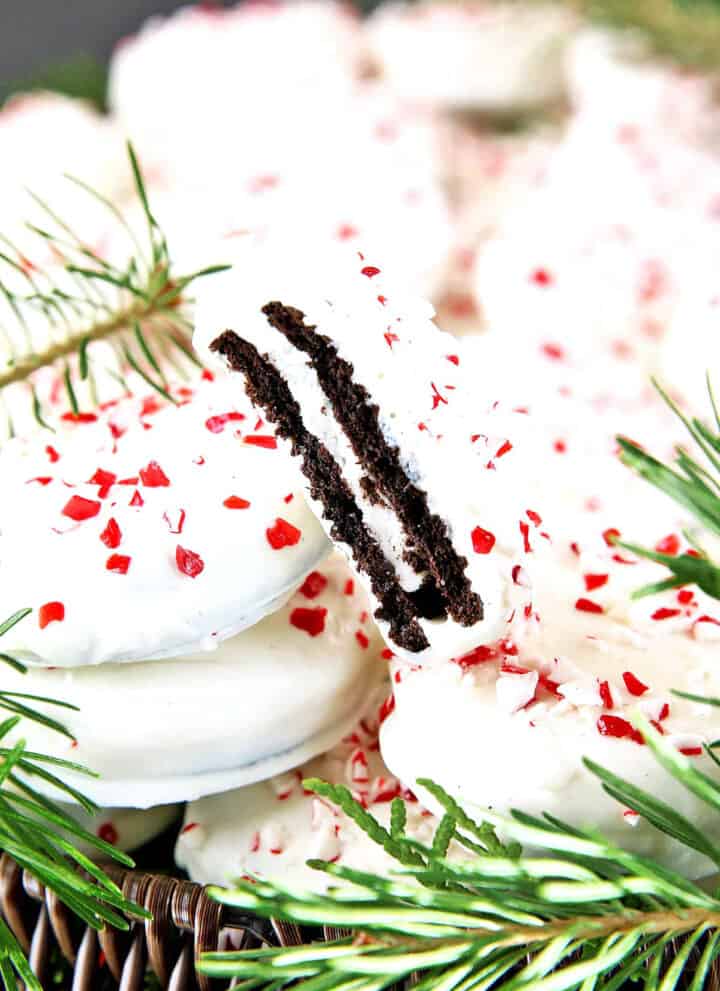 Oreos are getting a makeover! These White Chocolate Peppermint Oreo Cookies are a super easy and great activity for the kids to make for the holiday with minimal adult assistant.