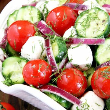 This Tomato and Mozzarella Salad is fresh and light with classic flavors! It's super easy to make at home and turns out great every single time.
