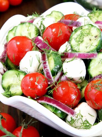 This Tomato and Mozzarella Salad is fresh and light with classic flavors! It's super easy to make at home and turns out great every single time.