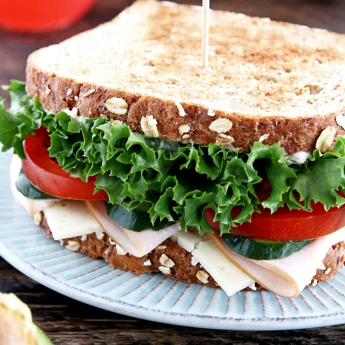 This Turkey Sandwich Recipe is one of our favorite sandwiches. The sandwich is loaded with vegetables of homegrown cucumber and tomatoes which makes it taste absolutely desirable.