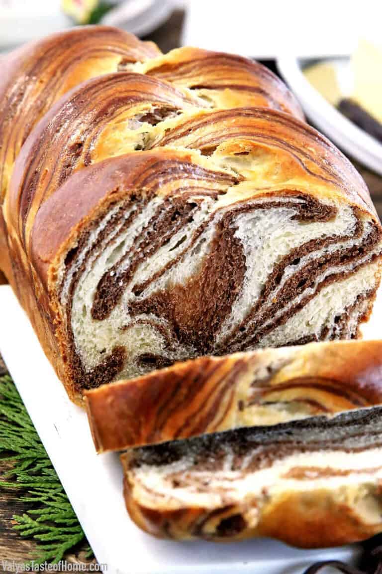 This Easy Soft and Fluffy Sweet Marbled Bread Recipe feature alluring swirls of vanilla and chocolate. Although it may look dizzyingly complicated it is actually super easy to make.