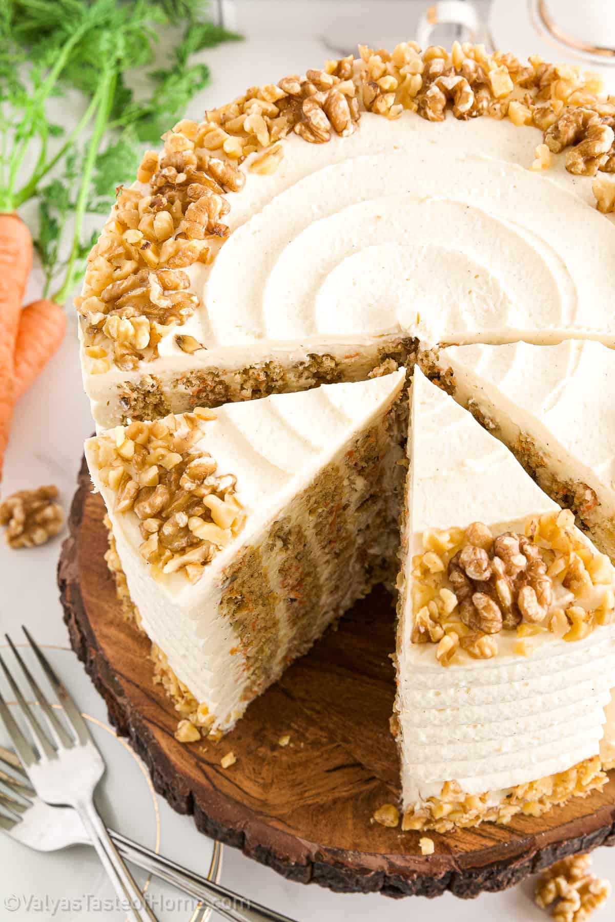 A carrot cake is a cake that contains grated carrots mixed into the batter, decorated using a white cream cheese frosting, and sprinkle with chopped nuts.
