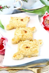 These Cream Cheese Puff Pastries recipe will give you the perfect cream cheese Danishes that are layers upon layers of crisp, flaky, buttery pastry topped with delicious vanilla cream cheese filling and sprinkled with sugary crumb goodness!