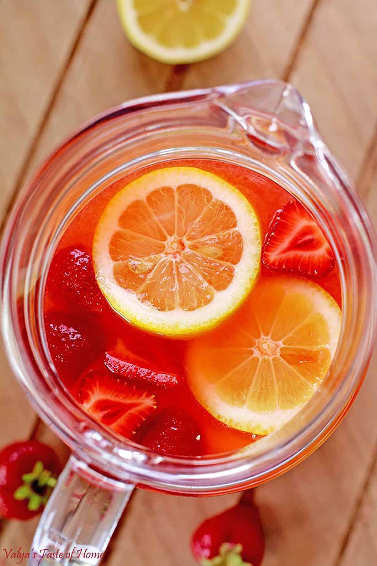 It’s made using freshly squeezed lemon juice and blended strawberries. It tastes a hundred times better than any powdered drink, crystal light, or even tang. Once you try it, you won’t be able to stop making it at home.