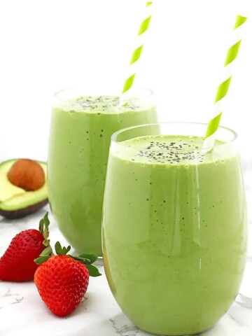 This tasty Spinach Smoothie recipe has the perfect combo of nutrients and taste. With a mix of strawberries and avocados, even picky eaters will love this one!