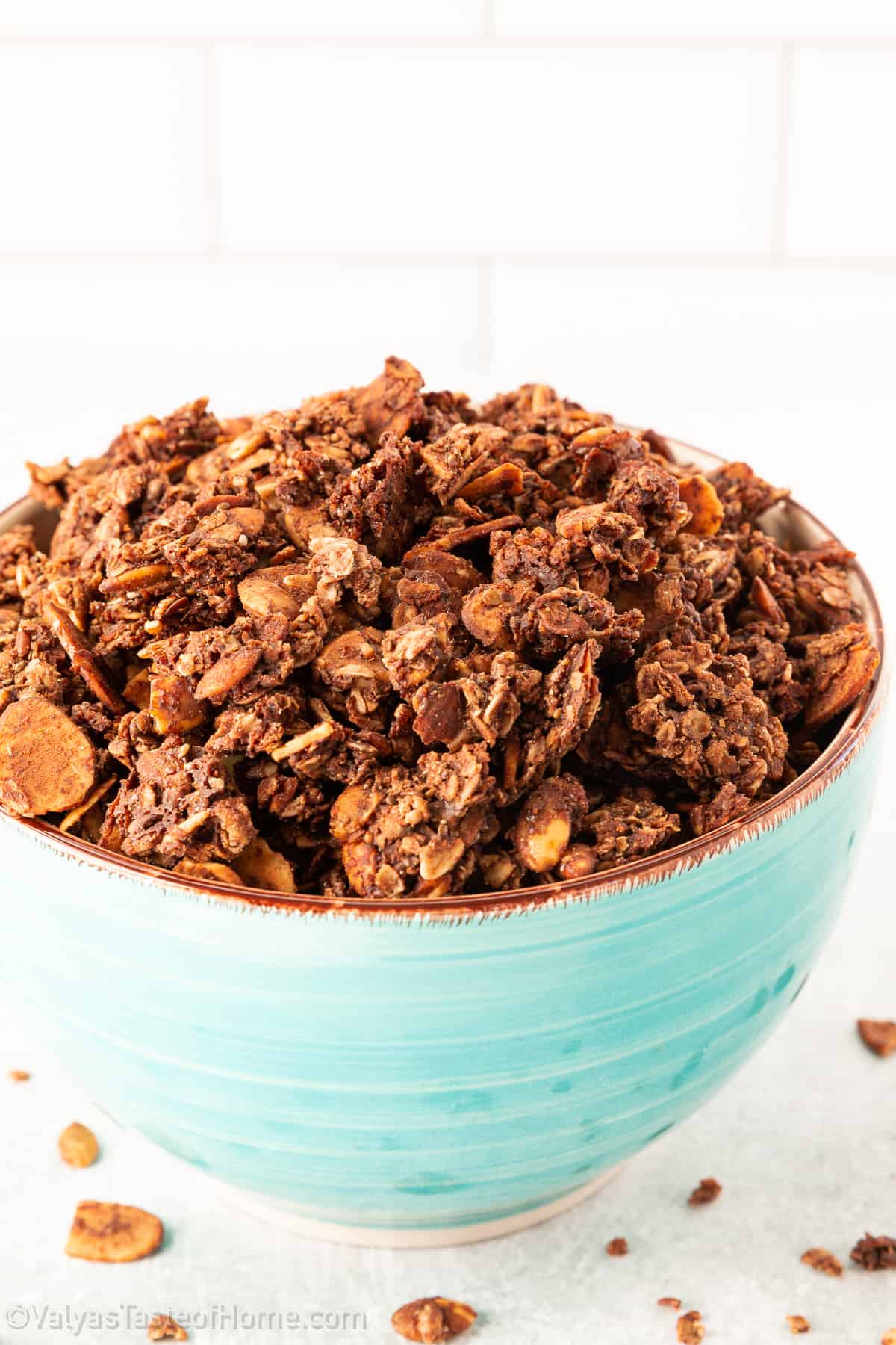 This easy Chocolate Granola recipe is super delicious and is made with healthy ingredients like oats, nuts, cacao, and maple for the perfect breakfast or snack!