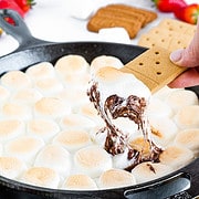 S'mores dip is a delectable delicacy that captures the essence of traditional s'mores in a melted and dippable form.
