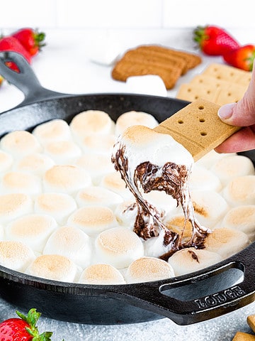 S'mores dip is a delectable delicacy that captures the essence of traditional s'mores in a melted and dippable form.