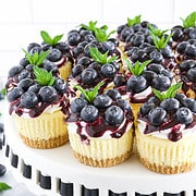 Blueberry cheesecake is a classic dessert that features a buttery graham cracker crust, rich and creamy cheesecake filling, and sweet and tangy blueberry topping.