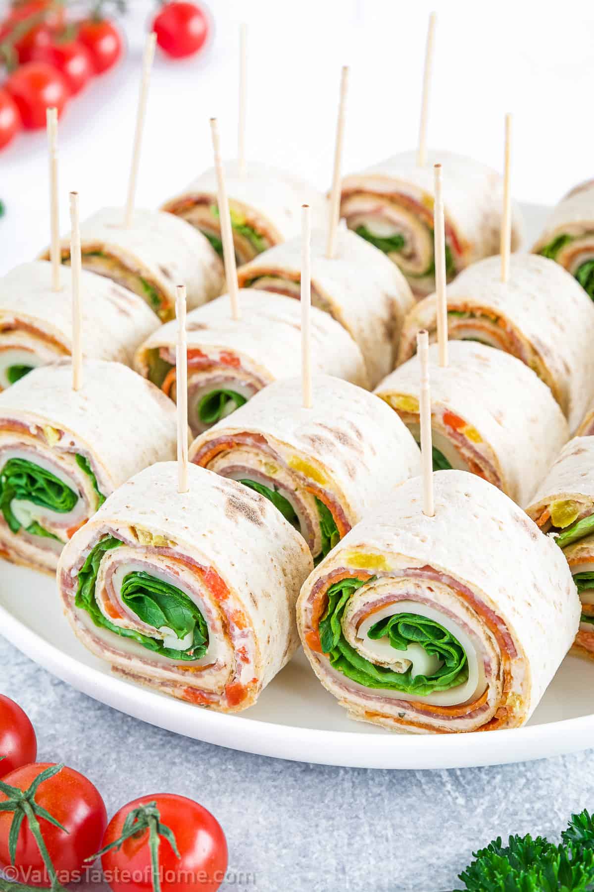 It features a delicious filling made with a combination of savory ingredients, such as salami and pepperoni, roasted red peppers, pasta sauce, cream cheese, and parmesan cheese for the tastiest pinwheels you’ve ever had!