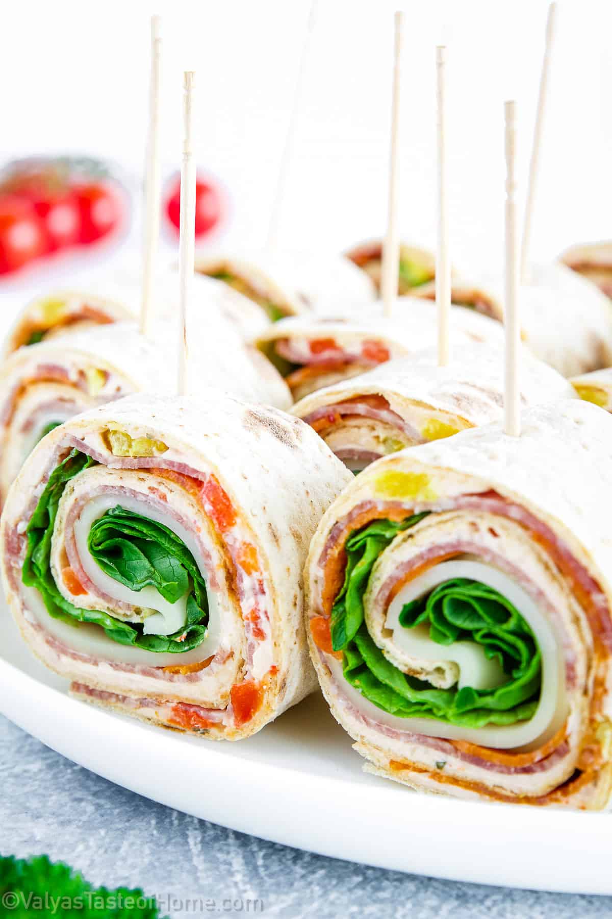 Italian pinwheels are a delicious appetizer made with tortilla, cheese, and various fillings such as roasted red peppers, salami, pepperonis, and cheese. 