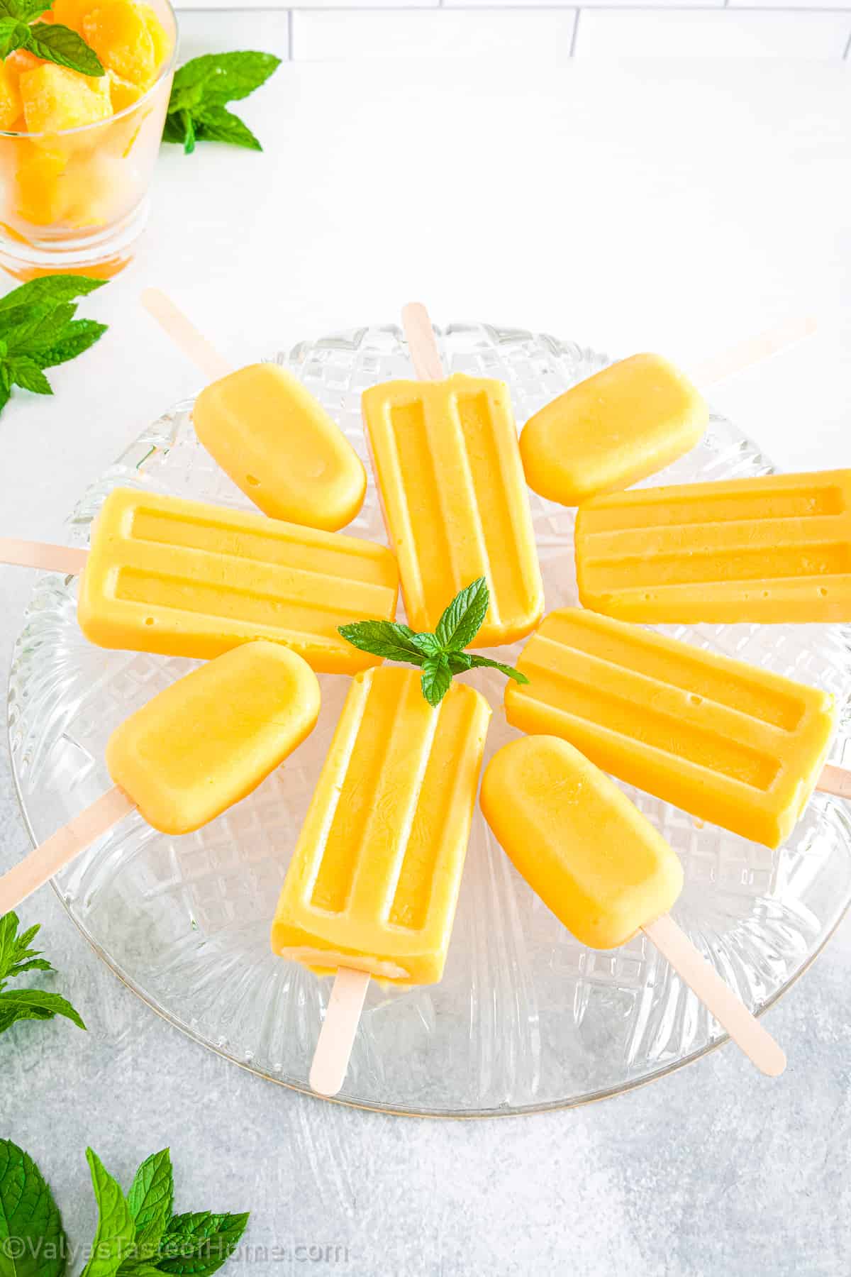 These mango popsicles are the perfect way to beat the summer heat and satisfy your cravings for something cool and fruity.