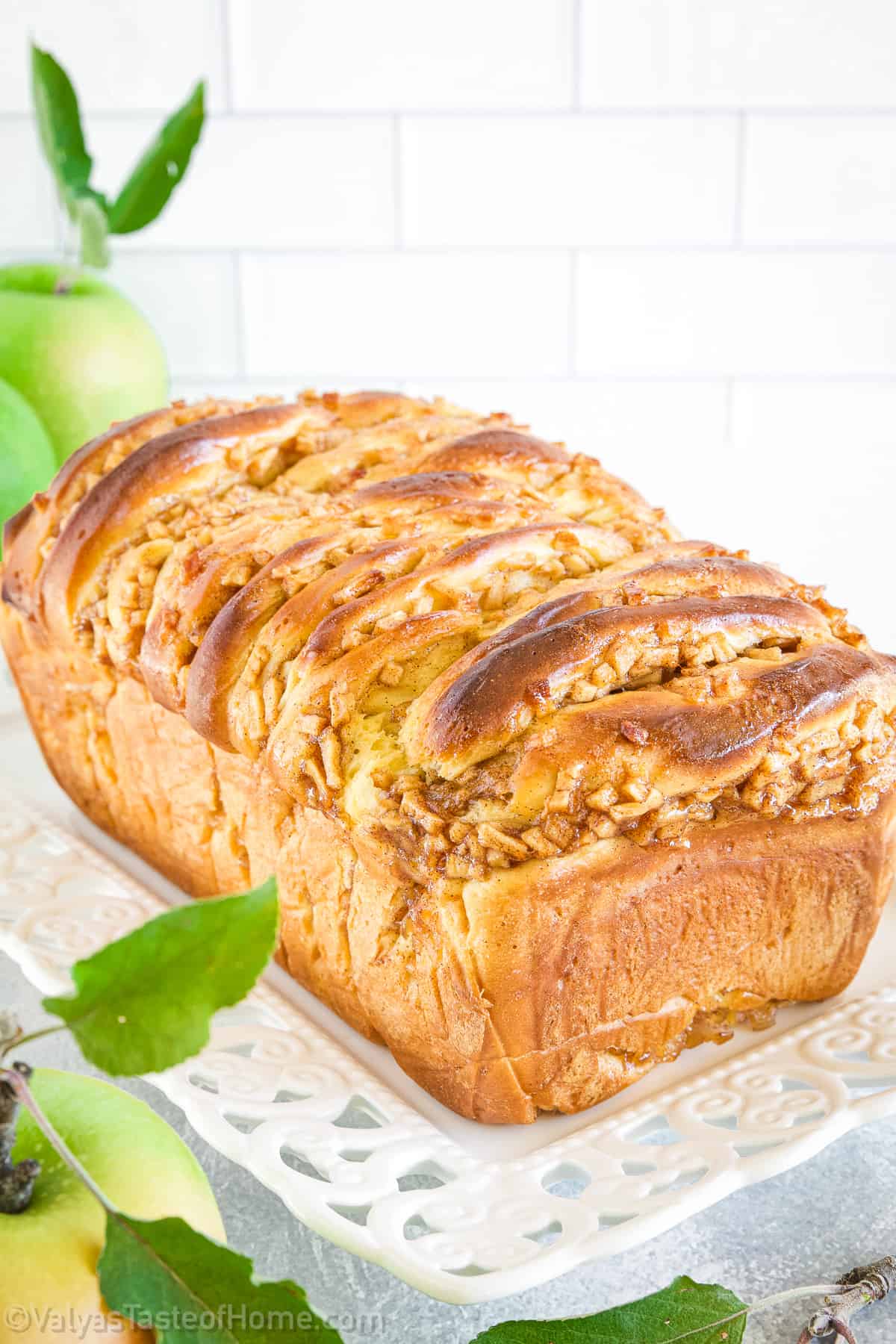 Apple fritter bread is a delicious sweet bread that is made with diced apples, cinnamon, and a sweet glaze.