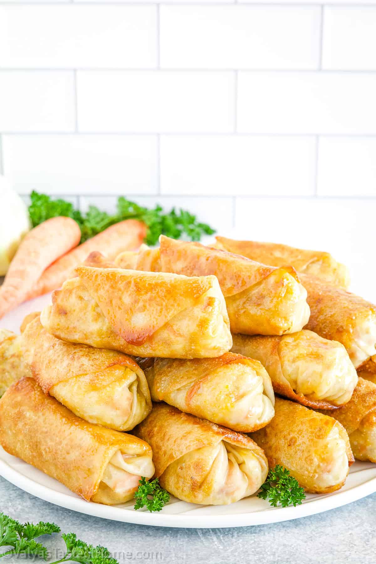 Homemade egg rolls are a popular Chinese dish that consists of a crispy, fried wrapper filled with a mixture of vegetables, meat, and sometimes noodles.