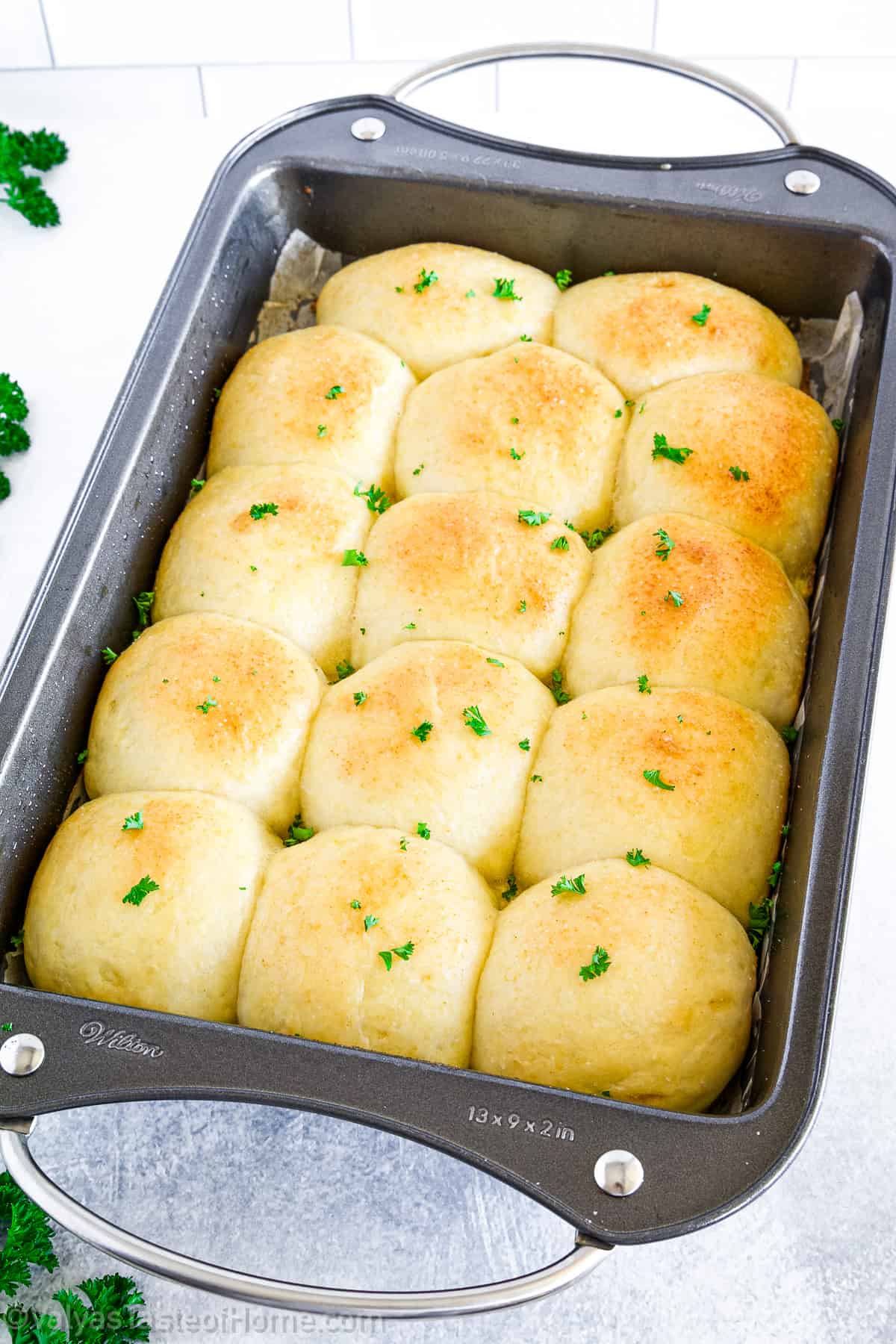 Garlic dinner rolls are rolls or bread that are flavored with garlic.