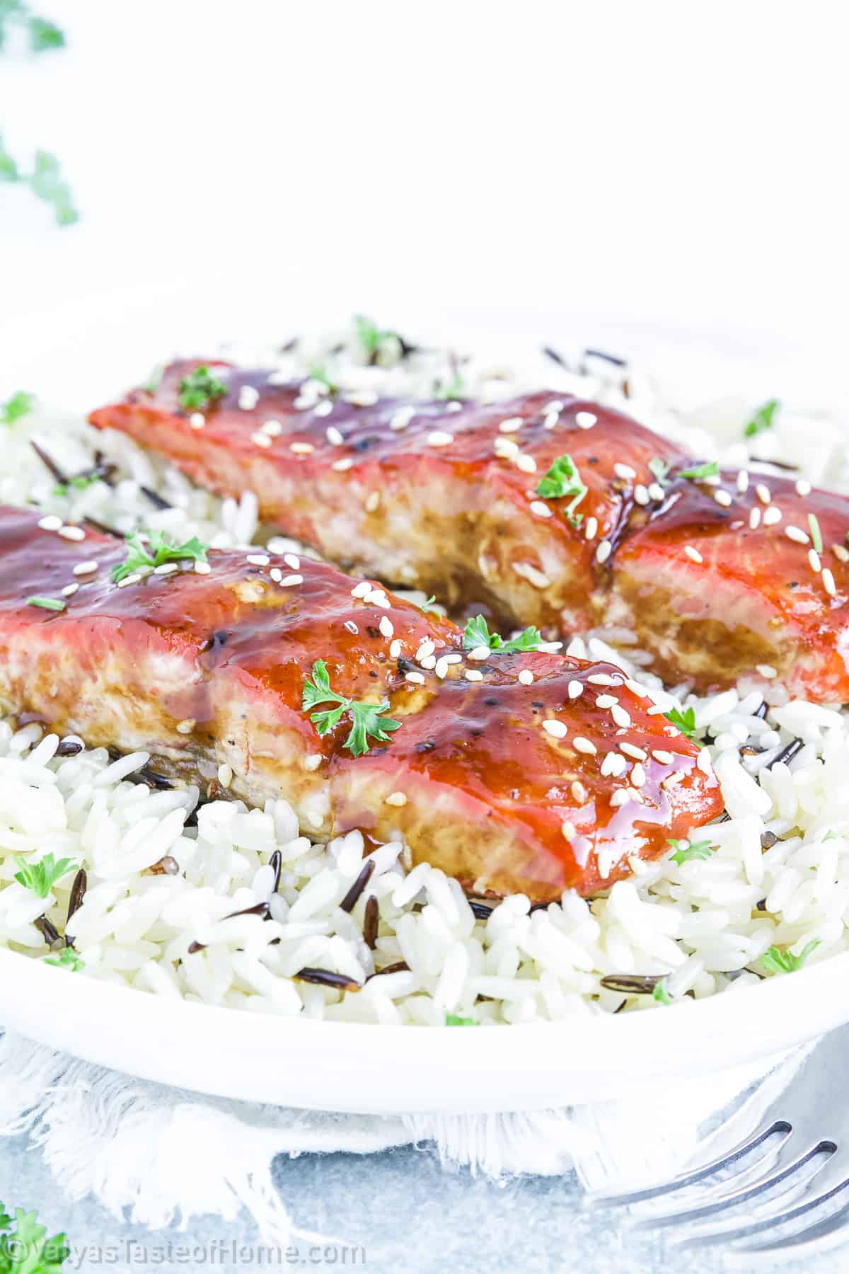 This delicious Teriyaki Salmon recipe is an incredible weeknight dinner option that brings the rich, savory flavors of the East right to your dinner table. 
