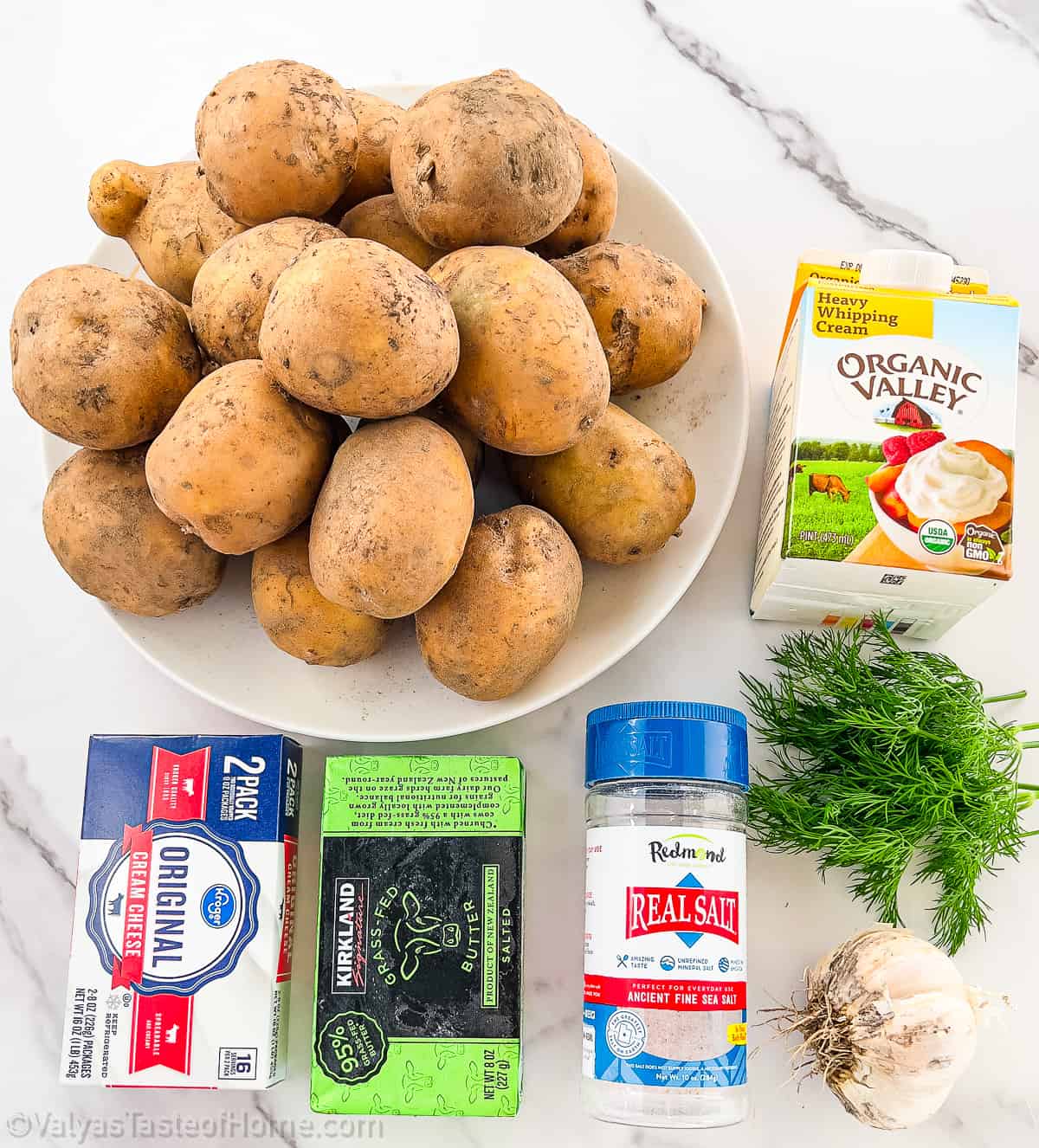 Beat the potatoes and garlic butter together using a hand mixer on high for about thirty seconds.