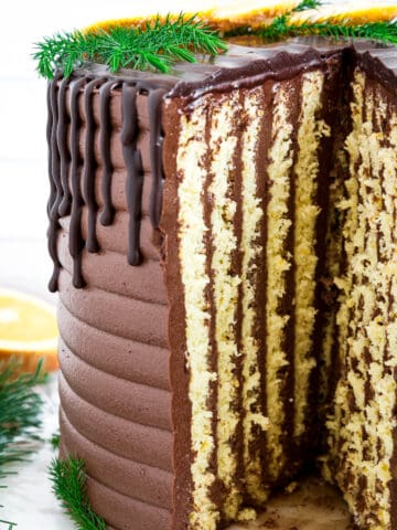 Chocolate orange cake is a delicious blend of rich chocolate and refreshing citrus flavors. It’s made by primarily combining a moist, orange-infused cake with a creamy, chocolate frosting. 