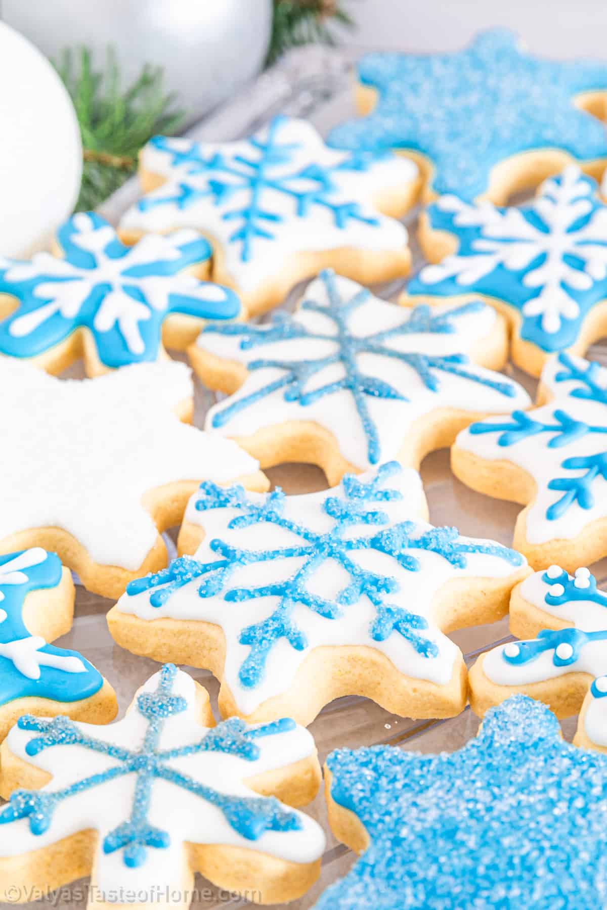 Making snowflake cookies with royal icing at home is a fun activity that can involve the entire family. 