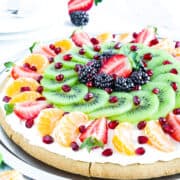 What’s a great dessert option that everyone will love? This sugar cookie fruit pizza recipe is quick and customizable, and a hit among adults and kids alike!