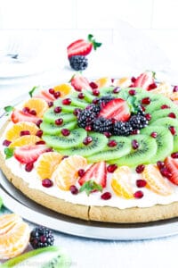What’s a great dessert option that everyone will love? This sugar cookie fruit pizza recipe is quick and customizable, and a hit among adults and kids alike!